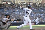 SAN DIEGO, CA - JULY 16:  Jesus Guzman #15 of the San Diego Padres hits a three-run homer during the first inning of a baseball game against the San Francisco Giants at Petco Park on July 16, 2011 in San Diego, California. (Photo by Denis Poroy/Getty Images)