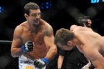DALLAS - SEPTEMBER 19:  UFC fighter Vitor Belfort  (L) battles UFC fighter Rich Franklin (R) during their Catch weight bout at UFC 103: Franklin vs. Belfort at the American Airlines Center on September 19, 2009 in Dallas, Texas.  (Photo by Jon Kopaloff/Getty Images)