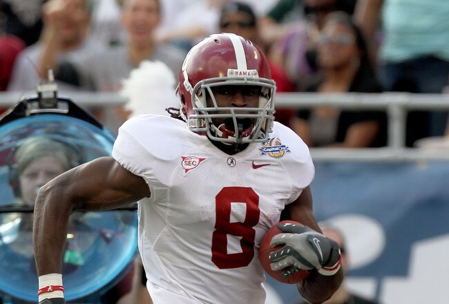 ORLANDO, FL - JANUARY 01:  Julio Jones #8 of the Alabama Crimson Tide rushes for a touchdown during the Capitol One Bowl against the Michigan State Spartans at the Florida Citrus Bowl on January 1, 2011 in Orlando, Florida.  (Photo by Mike Ehrmann/Getty Images)