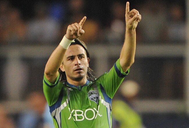 KANSAS CITY, KS - AUGUST 06:  Mid fielder Mauro Rosales #10 of the Seattle Sounders FC celebrates after scoring the tying goal in the 90th minute against  Sporting Kansas City on August 6, 2011 at LiveStrong Sporting Park in Kansas City, Kansas.  The Seattle Sounders FC defeated Sporting Kansas City 2-1.  (Photo by Peter G. Aiken/Getty Images)