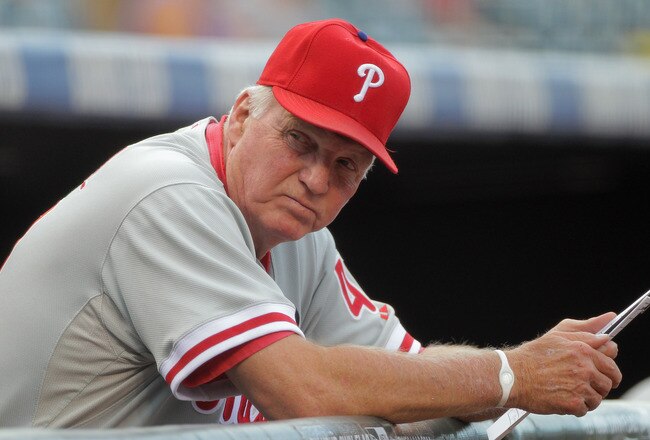 DENVER, CO - AUGUST 02:  Manager Charlie Manuel #41 of the Philadelphia Phillies looks on from the dugout against the Colorado Rockies at Coors Field on August 2, 2011 in Denver, Colorado.  (Photo by Doug Pensinger/Getty Images)
