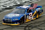 LONG POND, PA - AUGUST 07:  Brad Keselowski, driver of the #2 Miller Lite Dodge, celebrates after winning the NASCAR Sprint Cup Series Good Sam RV Insurance 500 at Pocono Raceway on August 7, 2011 in Long Pond, Pennsylvania.  (Photo by Jared C. Tilton/Getty Images)