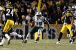 PITTSBURGH, PA - JANUARY 23:  Jerricho Cotchery #89 of the New York Jets runs for yards after the catch against the Pittsburgh Steelers during the 2011 AFC Championship game at Heinz Field on January 23, 2011 in Pittsburgh, Pennsylvania. The Steelers won 24-19.  (Photo by Al Bello/Getty Images)
