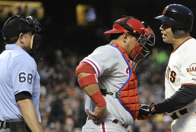 SAN FRANCISCO, CA - AUGUST 4: Carlos Beltran #15 of the San Francisco Giants lets home plate umpire Chris Guccione #68 know that he doesn't like the call strike three in the fourth inning during an MLB baseball game at AT&T Park August 4, 2011 in San Francisco, California. (Photo by Thearon W. Henderson/Getty Images)