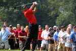 AKRON, OH - AUGUST 07:  Tiger Woods hits a shot during the final round of the World Golf Championships-Bridgestone Invitational on the South Course at Firestone Country Club on August 7, 2011 in Akron, Ohio.  (Photo by Andy Lyons/Getty Images)