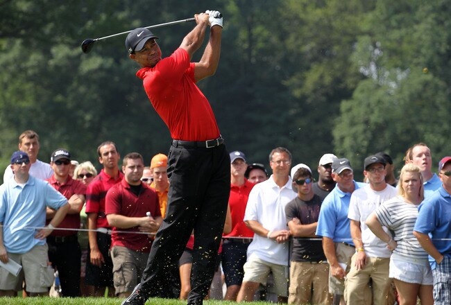 AKRON, OH - AUGUST 07:  Tiger Woods hits a shot during the final round of the World Golf Championships-Bridgestone Invitational on the South Course at Firestone Country Club on August 7, 2011 in Akron, Ohio.  (Photo by Andy Lyons/Getty Images)