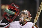 DALLAS, TX - FEBRUARY 11:  Goaltender Marty Turco #30 of the Chicago Blackhawks takes a drink against the Dallas Stas at American Airlines Center on February 11, 2011 in Dallas, Texas.  (Photo by Ronald Martinez/Getty Images)