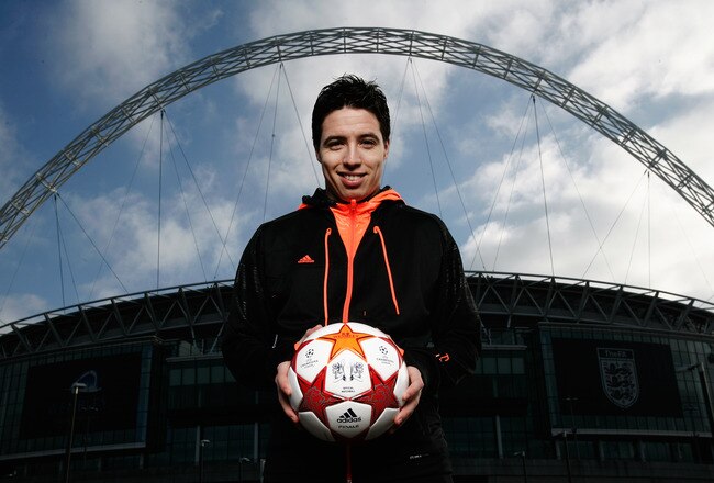 LONDON, ENGLAND - MARCH 03:  Samir Nasri of Arsenal is seen under the Wembley arch as adidas present the Official Match Ball for the 2011 UEFA Champions League Final at Wembley Stadium on March 3, 2011 in London, United Kingdom.  (Photo by Gary Prior/Getty Images for adidas)