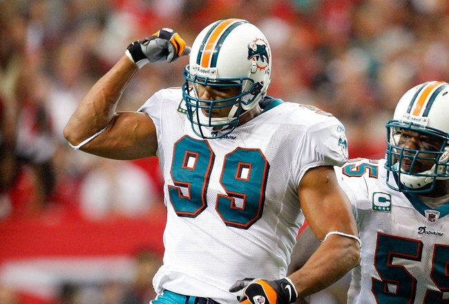 ATLANTA - SEPTEMBER 13:  Jason Taylor #99 and Joey Porter #55 of the Miami Dolphins against the Atlanta Falcons at Georgia Dome on September 13, 2009 in Atlanta, Georgia.  (Photo by Kevin C. Cox/Getty Images)