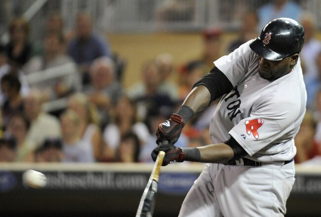 MINNEAPOLIS, MN - AUGUST 8: David Ortiz #34 of the Boston Red Sox hits a RBI single against the Minnesota Twins in the ninth inning on August 8, 2011 at Target Field in Minneapolis, Minnesota. The Red Sox defeated the Twins 8-6. (Photo by Hannah Foslien/Getty Images)