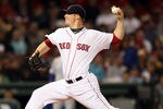 BOSTON, MA - JULY 25:  Jon Lester #31 of the Boston Red Sox delivers a pitch in the first inning against the Kansas City Royals on July 25, 2011 at Fenway Park in Boston, Massachusetts.  (Photo by Elsa/Getty Images)