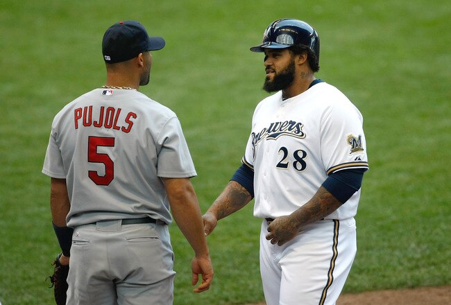 MILWAUKEE, WI - AUGUST 03: Prince Fielder #28 of the Milwaukee Brewers has words with Albert Pujols #5 of the St. Louis Cardinals at first base at Miller Park on August 3, 2011 in Milwaukee, Wisconsin. (Photo by Scott Boehm/Getty Images)