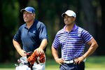 PONTE VEDRA BEACH, FL - MAY 10:  Tiger Woods (R) and caddie Steve Williams look on during a practice round prior to the start of THE PLAYERS Championship held at THE PLAYERS Stadium course at TPC Sawgrass on May 10, 2011 in Ponte Vedra Beach, Florida.  (Photo by Sam Greenwood/Getty Images)