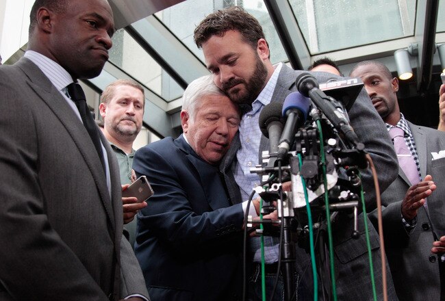 WASHINGTON, DC - JULY 25:  DeMaurice Smith (L)   executive director of the National Football League Players' Association looks on as New England Patriots owner Robert Kraft (C) is embraced by Indianapolis Colts center Jeff Saturday (R) during a news conference  on July 25, 2011 in Washington, DC. The NFL players and owners are set to agree on a labor deal and end the current lockout.  (Photo by Rob Carr/Getty Images)