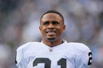 SAN DIEGO - DECEMBER 05:  Nnamdi Asomugha #21 the Oakland Raiders looks on from the sideline against the San Diego Chargers at Qualcomm Stadium on December 5, 2010 in San Diego, California. The Raiders defeated the Chargers 28-13.  (Photo by Jeff Gross/Getty Images)