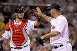 BOSTON, MA - AUGUST 3:  Tim Wakefield #49 of the Boston Red Sox celebrates with Jarrod Saltalamacchia #39 of the Boston Red Sox, who threw out a runner attempting to steal, during a game against the Cleveland Indians at Fenway Park on August 3, 2011 in Boston, Massachusetts.  Wakefield is attempting to earnhis 200 win with the Red Sox. (Photo by Jim Rogash/Getty Images)