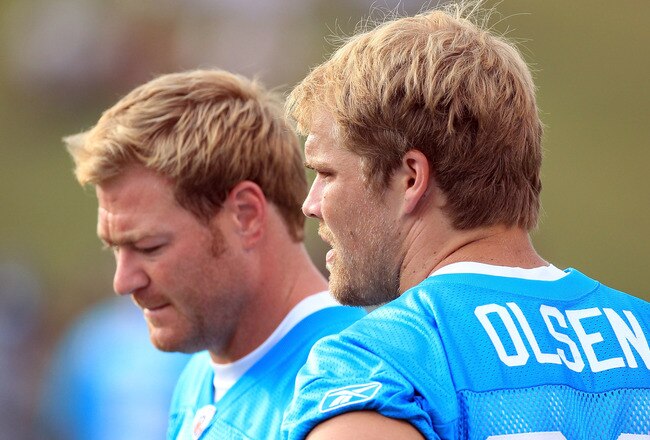 SPARTANBURG, SC - JULY 30:  Teammates Jeremy Shockey #80 and Greg Olsen #88 of the Carolina Panthers watch on during training camp at Wofford College on July 30, 2011 in Spartanburg, South Carolina.  (Photo by Streeter Lecka/Getty Images)