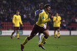 WIGAN, ENGLAND - DECEMBER 29:  Andrey Arshavin of Arsenal celebrates after scoring his goal during the Barclays Premier League match between Wigan Athletic and Arsenal at DW Stadium on December 29, 2010 in Wigan, England.  (Photo by Alex Livesey/Getty Images)