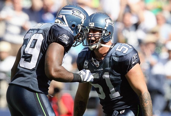 SEATTLE , WA - SEPTEMBER 13: Lofa Tatupu #51 of the Seattle Seahawks celebrates with Aaron Curry #59 during the game against the St. Louis Rams at Qwest Field on September 13, 2009 in Seattle, Washington. (Photo by Otto Greule Jr/Getty Images)