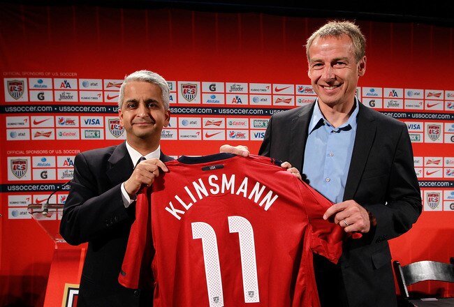 NEW YORK, NY - AUGUST 01:  U.S. Soccer President (L) Sunil Gulati officially announces (R) Jurgen Klinsmann as the new head coach of the U.S. Men’s National Team during a press conference at NikeTown on August 1, 2011 in New York City.  (Photo by Chris Trotman/Getty Images)