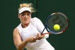 LONDON, ENGLAND - JUNE 22:   Bethanie Mattek-Sands of the United States returns a shot during her first round match against  Misaki Doi of Japan on Day Three of the Wimbledon Lawn Tennis Championships at the All England Lawn Tennis and Croquet Club on June 22, 2011 in London, England.  (Photo by Oli Scarff/Getty Images)