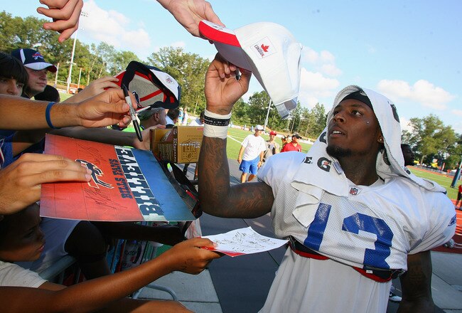 PITTSFORD, NY - AUGUST 08:  Stevie Johnson #13  of the Buffalo Bills signs autographs during the Buffalo Bills Training Camp at St. John Fisher College on August 8, 2011 in Pittsford, New York.  (Photo by Rick Stewart/Getty Images)