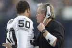 15 Dec 2001:   Chuck Bresnahan defensive coordinator for the Oakland Raiders talks with linebacker Eric Barton #50  during their game at Qualcomm Stadium in San Diego, California.  The Raiders won 13-6. DIGITAL IMAGE   Mandatory Credit:  Stephen Dunn/ALLSPORT