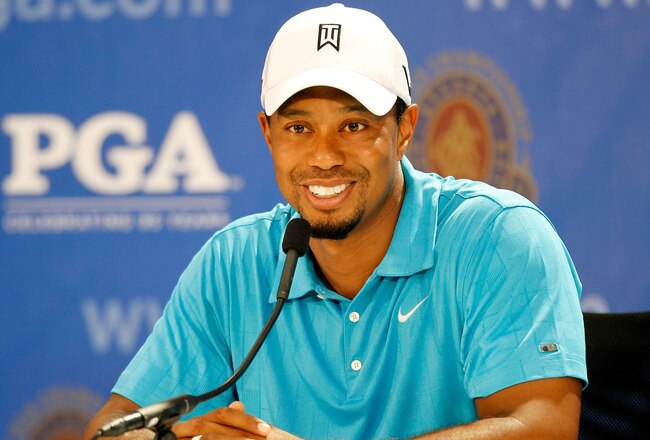 JOHNS CREEK, GA - AUGUST 10:  Tiger Woods talks with the media during a press conference after his practice round prior to the start of the 93rd PGA Championship at the Atlanta Athletic Club on August 10, 2011 in Johns Creek, Georgia.  (Photo by Mike Ehrmann/Getty Images)