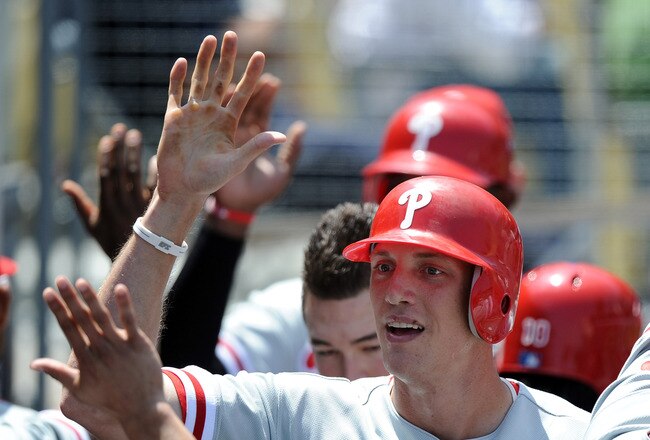 LOS ANGELES, CA - AUGUST 10:  Hunter Pence #3 of the Philadelphia Phillies celebrates his two run homerun with the dugout to trail 5-2 to the Los Angeles Dodgers during the fourth inning at Dodger Stadium on August 10, 2011 in Los Angeles, California.  (Photo by Harry How/Getty Images)