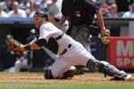NEW YORK, NY - JULY 27:  Russell Martin #55 of the New York Yankees against the Seattle Mariners in the fifth inning on July 27, 2011 at Yankee Stadium in the Bronx borough of New York City.  (Photo by Nick Laham/Getty Images)