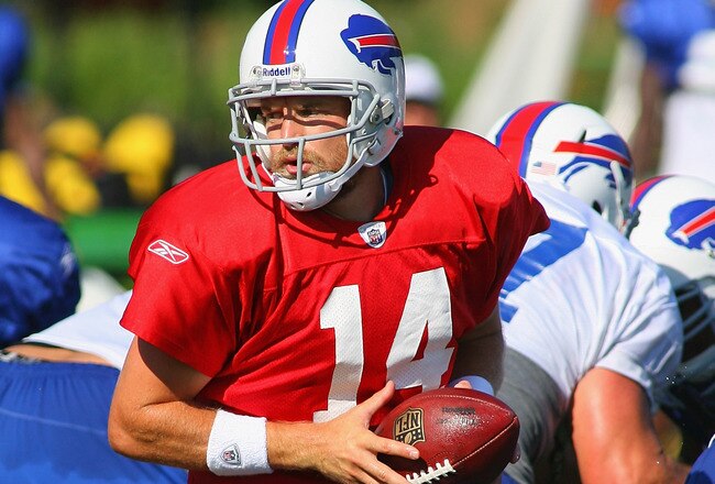 PITTSFORD, NY - AUGUST 08: Ryan Fitzpatrick #14 of the Buffalo Bills looks to hand off during Buffalo Bills Training Camp at St. John Fisher College on August 8, 2011 in Pittsford, New York.  (Photo by Rick Stewart/Getty Images)