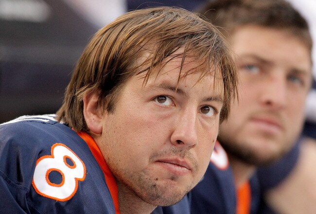 DENVER - OCTOBER 24:  Quarterbacks Kyle Orton #8 and Tim Tebow #15 of the Denver Broncos look on from the bench during their 59-14 loss to the Oakland Raiders at INVESCO Field at Mile High on October 24, 2010 in Denver, Colorado. (Photo by Justin Edmonds/Getty Images)