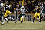 PITTSBURGH, PA - JANUARY 23:  Jerricho Cotchery #89 of the New York Jets runs for yards after the catch against the Pittsburgh Steelers during the 2011 AFC Championship game at Heinz Field on January 23, 2011 in Pittsburgh, Pennsylvania. The Steelers won 24-19.  (Photo by Al Bello/Getty Images)