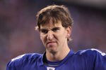 EAST RUTHERFORD, NJ - DECEMBER 19:  Eli Manning #10 of the New York Giants walks off the field dejected after losing to the Philadelphia Eagles 38-31  on December 19, 2010 at The New Meadowlands Stadium in East Rutherford, New Jersey.  (Photo by Al Bello/Getty Images)