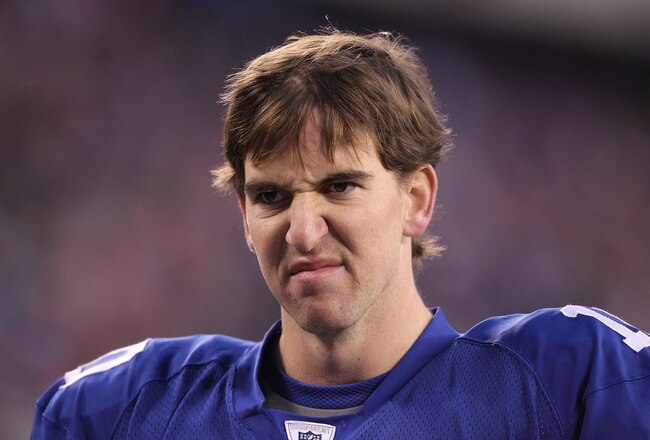 EAST RUTHERFORD, NJ - DECEMBER 19:  Eli Manning #10 of the New York Giants walks off the field dejected after losing to the Philadelphia Eagles 38-31  on December 19, 2010 at The New Meadowlands Stadium in East Rutherford, New Jersey.  (Photo by Al Bello/Getty Images)