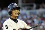 MINNEAPOLIS, MN - AUGUST 9: Tsuyoshi Nishioka #1 of the Minnesota Twins reacts to a strike during his at bat against the Boston Red Sox in the first inning with the bases loaded on August 9, 2011 at Target Field in Minneapolis, Minnesota. Tsuyoshi Nishioka went on to strike out. (Photo by Hannah Foslien/Getty Images)
