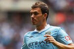LONDON, ENGLAND - AUGUST 07:  Edin Dzeko of Manchester City in action during the FA Community Shield match sponsored by McDonald's between Manchester City and Manchester United at Wembley Stadium on August 7, 2011 in London, England.  (Photo by Ian Walton/Getty Images)