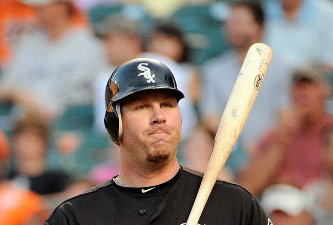 BALTIMORE, MD - AUGUST 10:  Adam Dunn #32 of the Chicago White Sox reacts after striking out against the Baltimore Orioles at Oriole Park at Camden Yards on August 10, 2011 in Baltimore, Maryland.  (Photo by Greg Fiume/Getty Images)