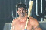 YOKOHAMA, JAPAN - MAY 26:  Former Oakland Athletics slugger Jose Canseco (L) walks to the ring with holding a bat prior to the match with Choi Hong-man at first Round of Super Hulk Tournament during Dream.9 at Yokohama Arena on May 26, 2009 in Yokohama, Kanagawa, Japan. Canseco lost at 1 minute 17 seconds in the first round.  (Photo by Hiroki Watanabe/Getty Images)