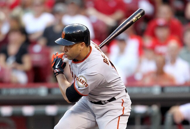 CINCINNATI, OH - JULY 30:  Carlos Beltran #15 of the San Francisco hits a pitch during the game against the Cincinnati Reds at Great American Ball Park on July 30, 2011 in Cincinnati, Ohio.  (Photo by Andy Lyons/Getty Images)