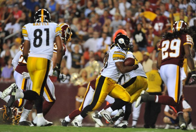 LANDOVER, MD - AUGUST 12:  Isaac Redman #33 of the Pittsburgh Steelers runs the ball in for a touchdown against the Washington Redskins at FedExField on August 12, 2011 in Landover, Maryland. The Redskins are tied with the Steelers 7-7 at the half. (Photo by Larry French/Getty Images)