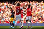 LONDON, ENGLAND - JULY 31:  Robin van Persie of Arsenal celebrates after scoring the opening goal with team mate Benik Afobe during the Emirates Cup match between Arsenal and New York Red Bulls at the Emirates Stadium on July 31, 2011 in London, England.  (Photo by Richard Heathcote/Getty Images)