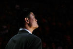 HOUSTON - APRIL 19:  Injured center Yao Ming #11 of the Houston Rockets watches pregame introductions for Game One of the Western Conference Quarterfinals against the Utah Jazz during the 2008 NBA Playoffs at the Toyota Center on April 19, 2008 in Houston, Texas. The Jazz won 93-82.  NOTE TO USER: User expressly acknowledges and agrees that, by downloading and or using this photograph, User is consenting to the terms and conditions of the Getty Images License Agreement.  (Photo by Stephen Dunn/Getty Images)