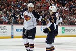 ANAHEIM, CA - OCTOBER 15:  Dustin Byfuglien #33 and Tobias Enstrom #39 of the Atlanta Thrashers celebrate a goal in the second period against the Anaheim Ducks at Honda Center on October 15, 2010 in Anaheim, California.  (Photo by Jeff Gross/Getty Images)