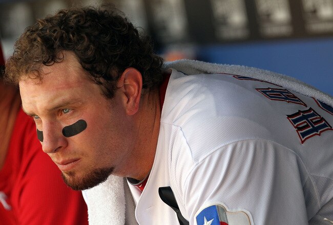ARLINGTON, TX - JULY 10:  Josh Hamilton #32 of the Texas Rangers sits in the dugout during play against the Oakland Athletics at Rangers Ballpark in Arlington on July 10, 2011 in Arlington, Texas.  (Photo by Ronald Martinez/Getty Images)