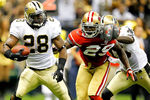 NEW ORLEANS, LA - AUGUST 12: Mark Ingram # 28 of the New Orleans Saints runs into the end zone for a touchdown against the San Francisco 49ers during their pre season game at Louisiana Superdome on August 12, 2011 in New Orleans, Louisiana.  (Photo by Sean Gardner/Getty Images)