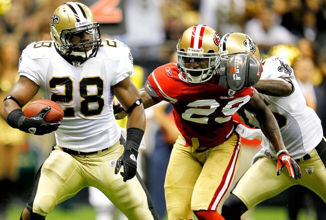 NEW ORLEANS, LA - AUGUST 12: Mark Ingram # 28 of the New Orleans Saints runs into the end zone for a touchdown against the San Francisco 49ers during their pre season game at Louisiana Superdome on August 12, 2011 in New Orleans, Louisiana.  (Photo by Sean Gardner/Getty Images)