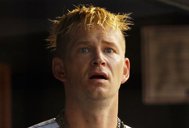 NEW YORK, NY - AUGUST 09:  A.J. Burnett #34 of the New York Yankees looks on from the bench during the game against the Los Angeles Angels of Anaheim on August 09, 2011 at Yankee Stadium in the Bronx borough of New York City.  (Photo by Mike Stobe/Getty Images)