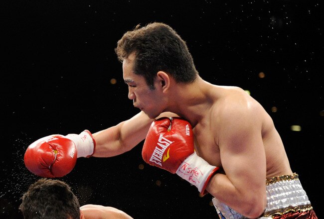 LAS VEGAS, NV - FEBRUARY 19:  Nonito Donaire (R) of the Philippines throws a right at Fernando Montiel of Mexico in the second round of their WBC/WBO bantamweight championship bout at the Mandalay Bay Events Center February 19, 2011 in Las Vegas, Nevada. Donaire won by TKO in the second round.  (Photo by Ethan Miller/Getty Images)