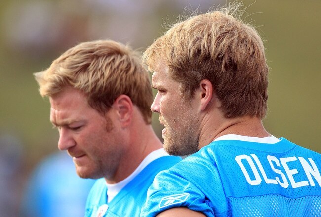 SPARTANBURG, SC - JULY 30:  Teammates Jeremy Shockey #80 and Greg Olsen #88 of the Carolina Panthers watch on during training camp at Wofford College on July 30, 2011 in Spartanburg, South Carolina.  (Photo by Streeter Lecka/Getty Images)